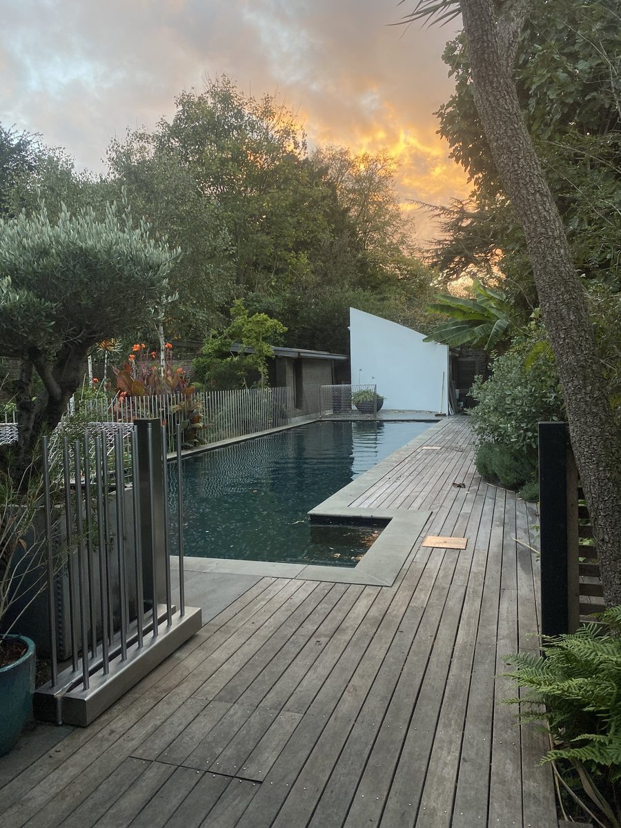 Bifold gate and pool at dusk