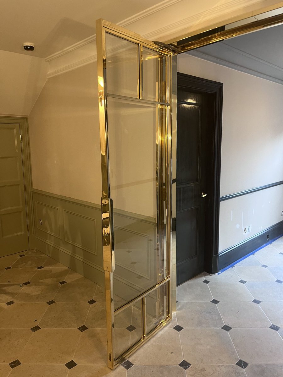 Finished brass door installed